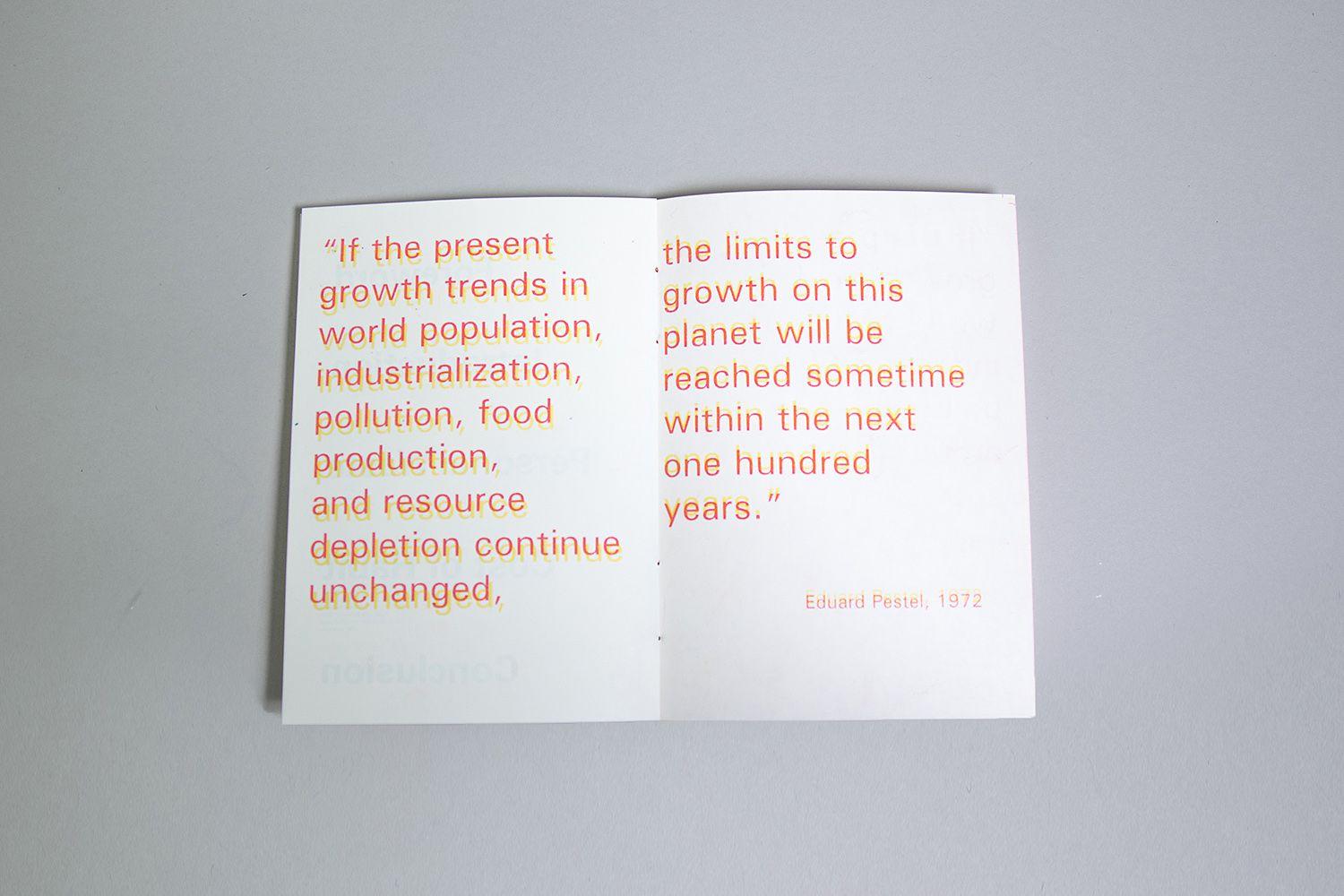 A book laying open. The paper is white and there is some type in orange.